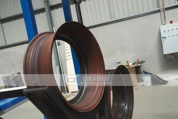 Hanger-Chain-Type-Tractor-Wheels-Shot-Blasting-Machine-5.jpg
